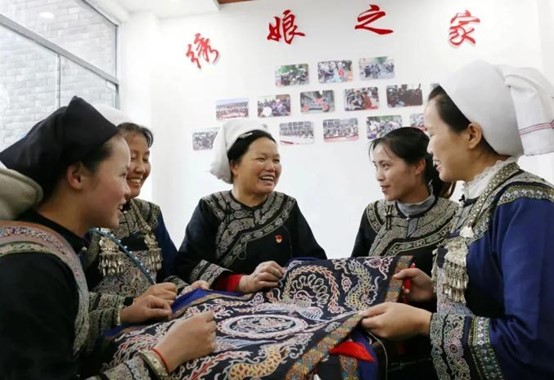 former impoverished residents gathered at a Horsetail embroidery workshop “crafting” their fortune