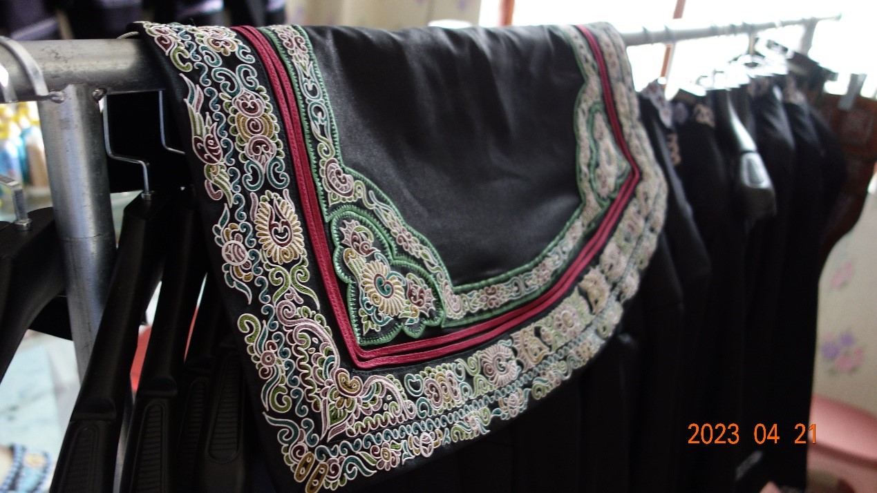 exquisite embroideries on traditional Shui garments