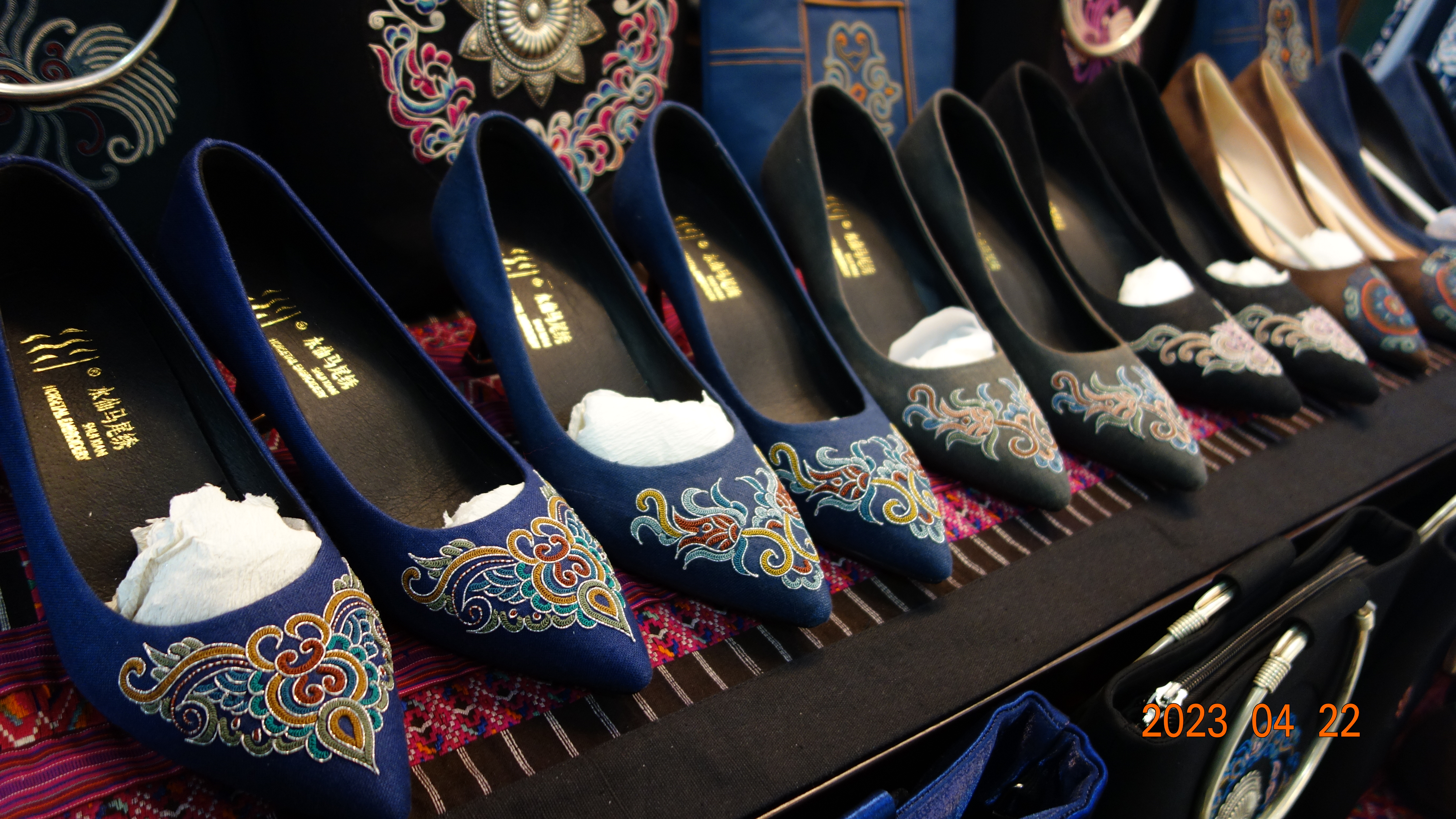 Horsetail embroidery being applied to the making of high-heels